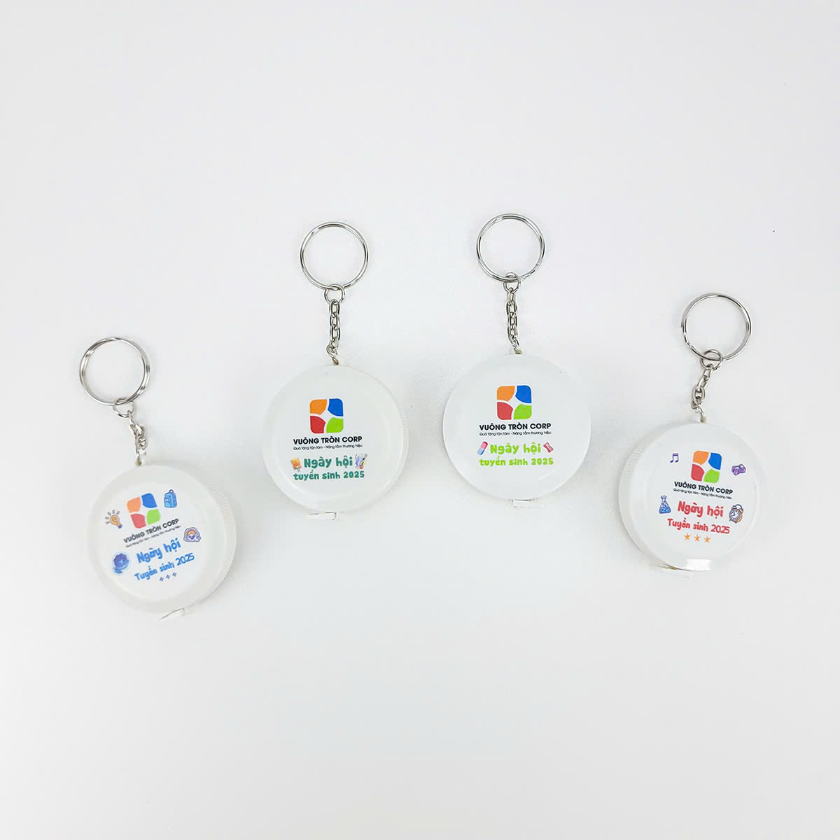 Móc khóa quảng cáo tuyển sinh in logo trường học, quà tặng tiện dụng cho sinh viên